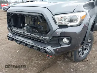 2021 Toyota Tacoma 4WD SR with VIN 3TMCZ5AN2MM406293, listed as a IAAI auction lot 41925585 with 52,243 mi miles. Bid and sale history available at carsss.com. Image 17.