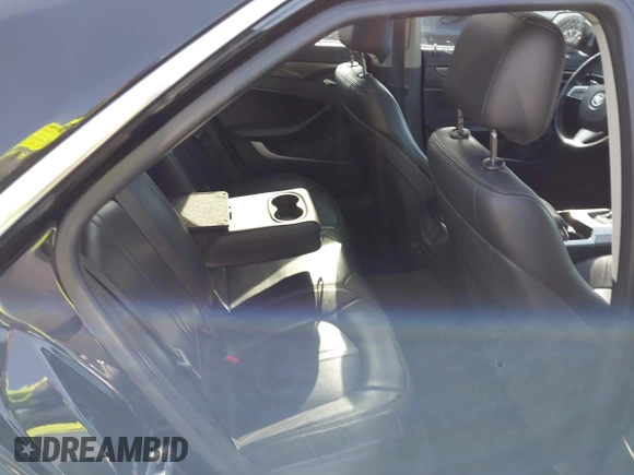 2012 Cadillac CTS with VIN 1G6DM5E39C0106931, listed as a IAAI auction lot 41909732 with 213,319 mi miles and . Bid and sale history available at DreamBid. Image 8.