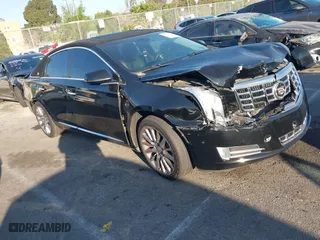 2014 Cadillac XTS Luxury with VIN 2G61M5S31E9290150, listed as a IAAI auction lot 41653055 with 174,553 mi miles. Bid and sale history available at carsss.com. Image 1.