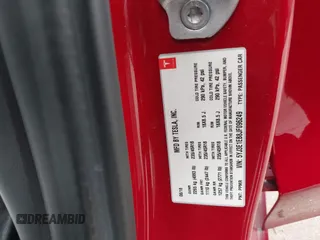2018 Tesla Model 3 Long Range Battery z VIN 5YJ3E1EB8JF096249, wystawiony jako IAAI lot #42150031 z przebiegiem 70 981 mil mil oraz . Historia ofert i sprzedaży dostępna na DreamBid. Obrazek 9.