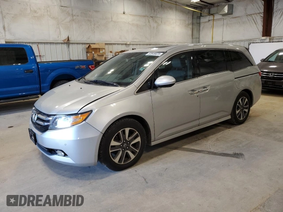 2014 Honda Odyssey Touring with VIN 5FNRL5H97EB005977, listed as a Copart auction lot 53849025 with 229,915 mi miles and Non Repairable. Bid and sale history available at DreamBid. Image 1.