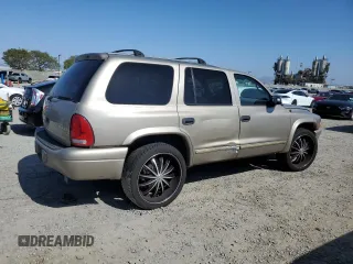2003 Dodge Durango SLT z VIN 1D4HR48N83F519253, wystawiony jako Copart lot #55179995 z przebiegiem 193 596 mil mil oraz Szkoda całkowita • Salvage title. Historia ofert i sprzedaży dostępna na DreamBid. Obrazek 3.
