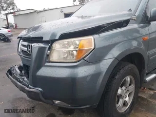 2006 Honda Pilot EX-L with VIN 2HKYF18506H503658, listed as a IAAI auction lot 41744963 with 215,575 mi miles. Bid and sale history available at carsss.com. Image 6.