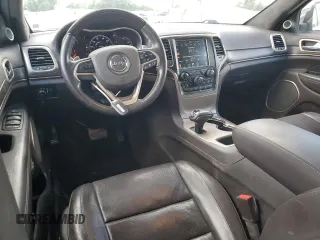 2014 Jeep Grand Cherokee Summit с VIN 1C4RJEJG4EC380074, выставлен на аукционе Copart как лот 64123175 с пробегом 237 803 миль миль и Списание • Salvage title. История ставок и продаж доступна на DreamBid. Изображение 8.