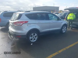 2014 Ford Escape SE with VIN 1FMCU9GX9EUB98758, listed as a IAAI auction lot 41717257 with 126,358 mi miles. Bid and sale history available at carsss.com. Image 4.