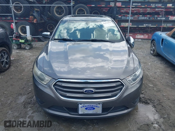 2013 Ford Taurus Limited z VIN 1FAHP2F88DG195677, wystawiony jako IAAI lot #42476918 z przebiegiem 197 732 mil mil oraz . Historia ofert i sprzedaży dostępna na DreamBid. Obrazek 12.