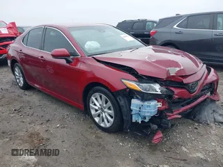 2020 Toyota Camry LE with VIN 4T1C11AK1LU359477, listed as a IAAI auction lot 41800546 with 109,319 mi miles and . Bid and sale history available at DreamBid. Image 1.