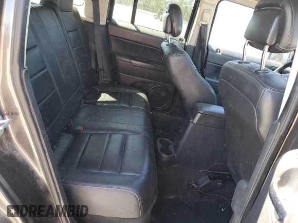 2014 Jeep Patriot High Altitude with VIN 1C4NJPFAXED758133, listed as a Copart auction lot 48975185 with 193,633 mi miles and Salvage Title. Bid and sale history available at carsss.com. Image 11.
