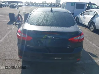 2012 Ford Focus SE with VIN 1FAHP3F26CL236976, listed as a IAAI auction lot 42302561 with 177,476 mi miles and . Bid and sale history available at DreamBid. Image 16.