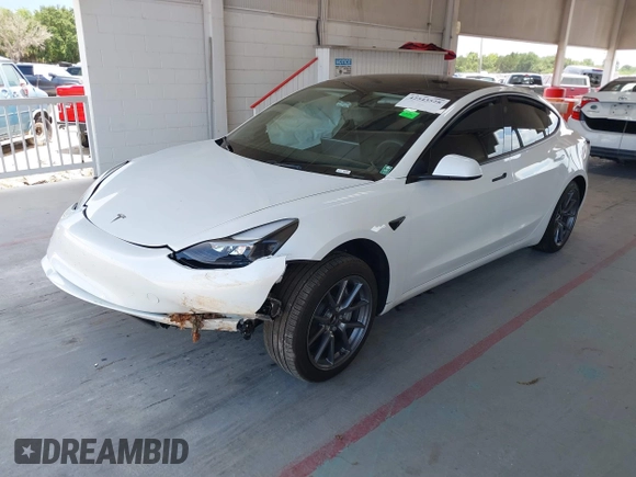 2023 Tesla Model 3 z VIN 5YJ3E1EAXPF606178, wystawiony jako IAAI lot #42543528 z przebiegiem 26 638 mil mil oraz . Historia ofert i sprzedaży dostępna na DreamBid. Obrazek 21.