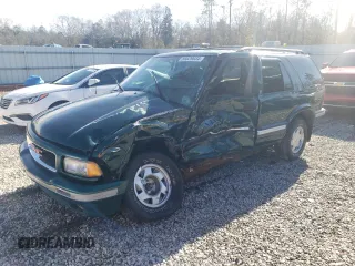 1997 GMC Jimmy SL with VIN 1GKCS13W2V2518446, listed as a Copart auction lot 86629634 with 183,089 mi miles and Salvage Title. Bid and sale history available at carsss.com. Image 1.