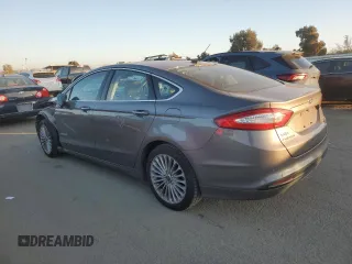 2013 Ford Fusion Titanium Hybrid with VIN 3FA6P0RU1DR292037, listed as a Copart auction lot 89368505 with 184,282 mi miles and Salvage Title. Bid and sale history available at carsss.com. Image 2.
