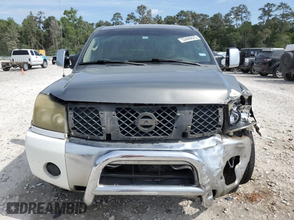 2004 Nissan Titan LE with VIN 1N6AA07A44N580326, listed as a Copart auction lot 53446825 with 236,618 mi miles and Salvage title. Bid and sale history available at DreamBid. Image 5.