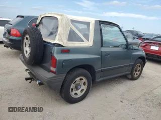 1994 Geo Tracker z VIN 2CNBE18U1R6918878, wystawiony jako Copart lot #75894834 z przebiegiem Nie podano mil oraz Nie do naprawy. Historia ofert i sprzedaży dostępna na DreamBid. Obrazek 3.