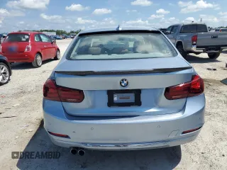 2013 BMW 3 Series 328i with VIN WBA3A5G59DNP20265, listed as a Copart auction lot 61650995 with 221,317 mi miles and Clean title. Bid and sale history available at DreamBid. Image 6.