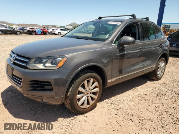 2012 Volkswagen Touareg Sport z VIN WVGFK9BPXCD003600, wystawiony jako Copart lot #61783705 z przebiegiem 171 598 mil mil oraz Czysty tytuł • Clean title. Historia ofert i sprzedaży dostępna na DreamBid. Obrazek 1.