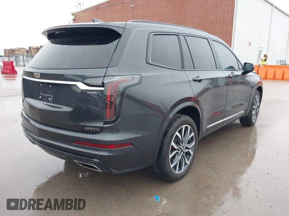 2023 Cadillac XT6 AWD Sport with VIN 1GYKPGRS0PZ177620, listed as a IAAI auction lot 42432423 with 24,070 mi miles and . Bid and sale history available at DreamBid. Image 4.