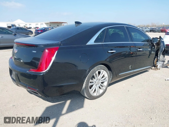 2018 Cadillac XTS Luxury with VIN 2G61M5S36J9120571, listed as a IAAI auction lot 41486816 with 77,302 mi miles. Bid and sale history available at carsss.com. Image 4.