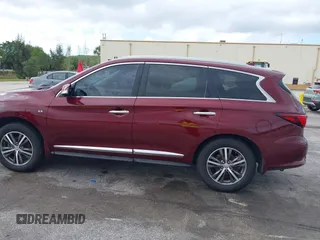 2019 Infiniti QX60 LUXE with VIN 5N1DL0MN3KC502044, listed as a IAAI auction lot 42130349 with 276,156 mi miles. Bid and sale history available at carsss.com. Image 14.