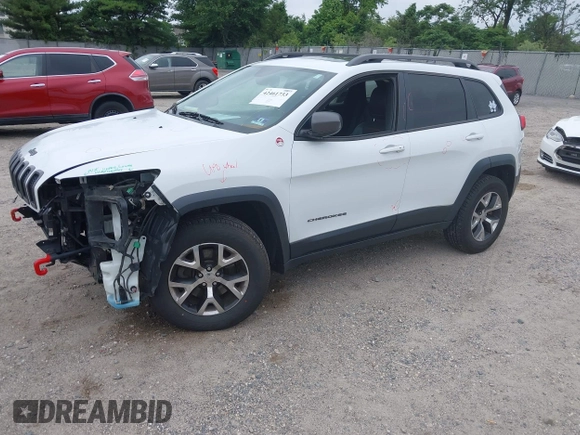 2014 Jeep Cherokee Trailhawk z VIN 1C4PJMBS4EW210719, wystawiony jako IAAI lot #42461733 z przebiegiem 134 096 mil mil oraz . Historia ofert i sprzedaży dostępna na DreamBid. Obrazek 19.