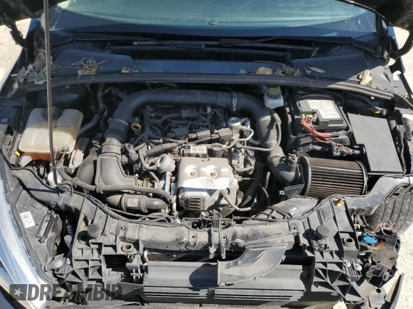 2018 Ford Focus SE z VIN 1FADP3FEXJL256542, wystawiony jako Copart lot #54583915 z przebiegiem 107 774 mil mil oraz Szkoda całkowita • Salvage title. Historia ofert i sprzedaży dostępna na DreamBid. Obrazek 11.