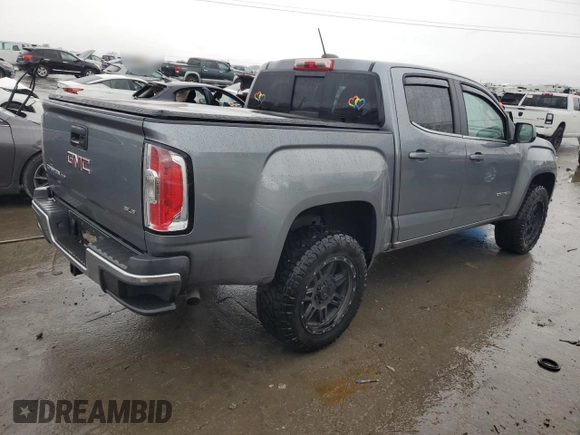 2018 GMC Canyon 2WD SLE with VIN 1GTG5CEN5J1216265, listed as a Copart auction lot 81245954 with 77,464 mi miles and Salvage Title. Bid and sale history available at carsss.com. Image 3.