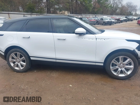 2020 Land Rover Range Rover Velar S z VIN SALYB2EX4LA238438, wystawiony jako IAAI lot #41504741 z przebiegiem 62 665 mil mil oraz . Historia ofert i sprzedaży dostępna na DreamBid. Obrazek 14.
