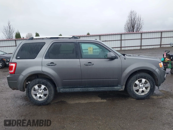 2011 Ford Escape Limited with VIN 1FMCU9E77BKC23697, listed as a IAAI auction lot 41925905 with 167,513 mi miles and . Bid and sale history available at DreamBid. Image 14.