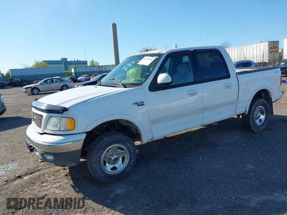 2003 Ford F-150 XLT with VIN 1FTRW08633KD11896, listed as a IAAI auction lot 42137360 with 118,654 mi miles. Bid and sale history available at carsss.com. Image 2.