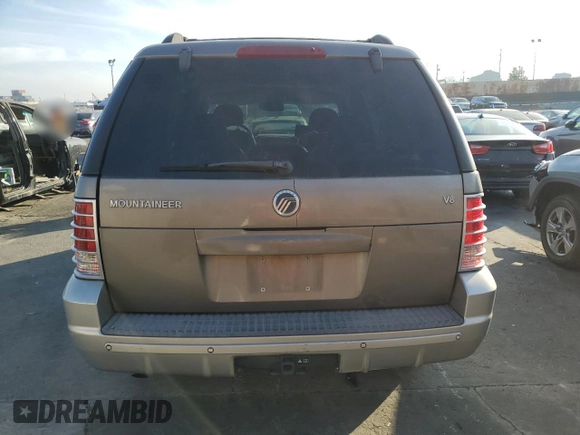 2002 Mercury Mountaineer Convenience z VIN 4M2ZU66W72ZJ38041, wystawiony jako Copart lot #86024514 z przebiegiem 264 952 mil mil oraz Szkoda całkowita • Salvage title. Historia ofert i sprzedaży dostępna na DreamBid. Obrazek 6.