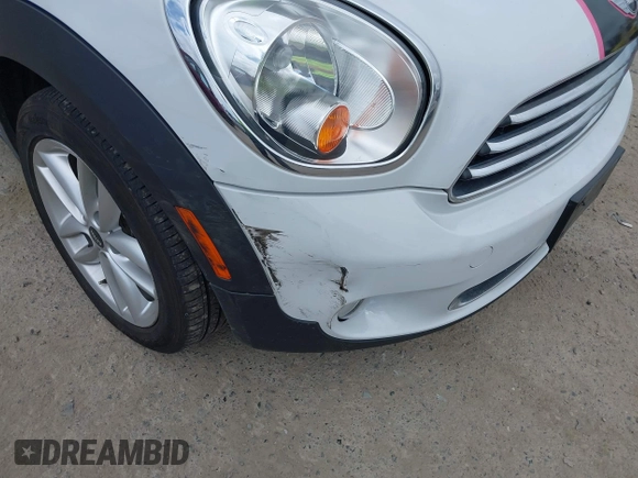 2014 MINI Countryman with VIN WMWZB3C5XEWR37594, listed as a IAAI auction lot 42500466 with 67,589 mi miles and . Bid and sale history available at DreamBid. Image 15.