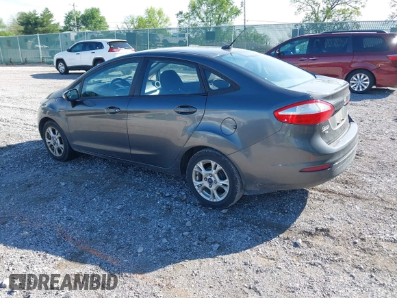 2015 Ford Fiesta SE z VIN 3FADP4BJ7FM158471, wystawiony jako IAAI lot #42090819 z przebiegiem 139 779 mil mil oraz . Historia ofert i sprzedaży dostępna na DreamBid. Obrazek 3.
