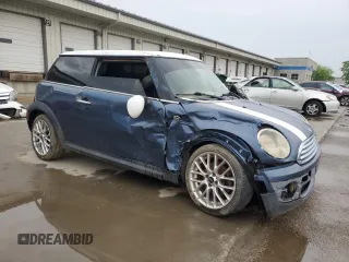 2010 MINI Hardtop with VIN WMWMF3C59ATZ28119, listed as a Copart auction lot 56213355 with 179,994 mi miles and Non Repairable. Bid and sale history available at DreamBid. Image 4.