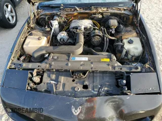 1992 Pontiac Firebird z VIN 1G2FS23T0NL203325, wystawiony jako Copart lot #76359414 z przebiegiem 198 651 mil mil oraz Nie do naprawy • Non repairable. Historia ofert i sprzedaży dostępna na DreamBid. Obrazek 11.