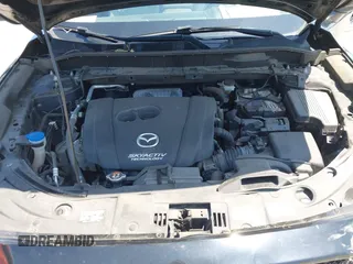 2017 Mazda CX-5 Grand Touring with VIN JM3KFBDL6H0200830, listed as a IAAI auction lot 42005145 with 90,510 mi miles. Bid and sale history available at carsss.com. Image 10.