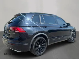 2021 Volkswagen Tiguan SE with VIN 3VV2B7AX7MM043942, listed as a Copart auction lot 65846305 with 117,829 mi miles and Clean title. Bid and sale history available at DreamBid. Image 4.