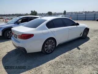 2020 BMW 5 Series 530e with VIN WBAJA9C03LCD28842, listed as a Copart auction lot 69901984 with 63,036 mi miles and Salvage Title. Bid and sale history available at DreamBid. Image 3.