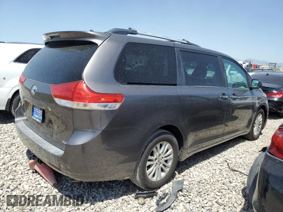 2011 Toyota Sienna XLE AAS with VIN 5TDYK3DCXBS134341, listed as a Copart auction lot 61602705 with 184,959 mi miles and Clean title. Bid and sale history available at DreamBid. Image 3.