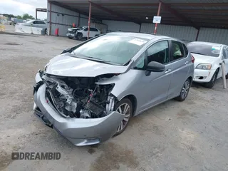 2017 Honda Fit EX with VIN JHMGK5H7XHS017443, listed as a IAAI auction lot 42109699 with 55,451 mi miles. Bid and sale history available at carsss.com. Image 2.