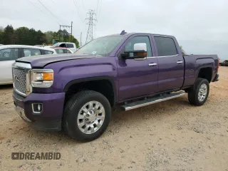 2017 GMC Sierra 2500HD Denali z VIN 1GT12UEG4HF127967, wystawiony jako Copart lot #51812665 z przebiegiem Nie podano mil oraz Szkody całkowita. Historia ofert i sprzedaży dostępna na DreamBid. Obrazek 1.