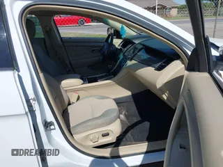 2015 Ford Taurus SEL z VIN 1FAHP2E8XFG196270, wystawiony jako IAAI lot #42007068 z przebiegiem 150 093 mil mil oraz . Historia ofert i sprzedaży dostępna na DreamBid. Obrazek 5.