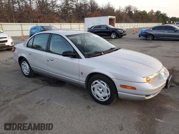 2001 Saturn SL z VIN 1G8ZK52761Z204012, wystawiony jako Copart lot #86618384 z przebiegiem 99 674 mil mil oraz Szkoda całkowita • Salvage title. Historia ofert i sprzedaży dostępna na DreamBid. Obrazek 4.