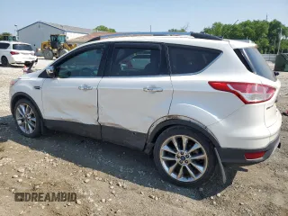2014 Ford Escape SE z VIN 1FMCU9G92EUC58400, wystawiony jako Copart lot #60491005 z przebiegiem 72 462 mil mil oraz Szkoda całkowita • Salvage title. Historia ofert i sprzedaży dostępna na DreamBid. Obrazek 2.