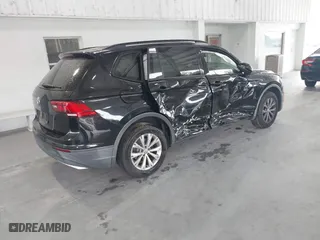 2019 Volkswagen Tiguan S with VIN 3VV1B7AX1KM073074, listed as a IAAI auction lot 41387775 with 57,045 mi miles. Bid and sale history available at carsss.com. Image 4.