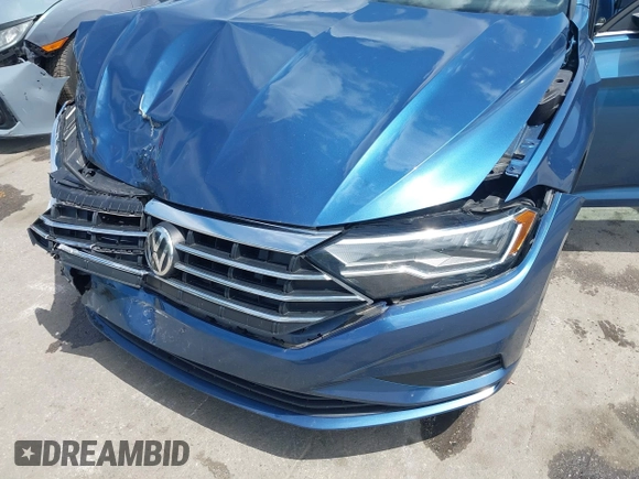 2021 Volkswagen Jetta S z VIN 3VWC57BU6MM046066, wystawiony jako IAAI lot #42199064 z przebiegiem 86 394 mil mil oraz . Historia ofert i sprzedaży dostępna na DreamBid. Obrazek 17.