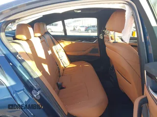 2023 BMW 5 Series 530e z VIN WBA13AG02PCM95685, wystawiony jako IAAI lot #41403195 z przebiegiem Nie podano mil oraz . Historia ofert i sprzedaży dostępna na DreamBid. Obrazek 8.