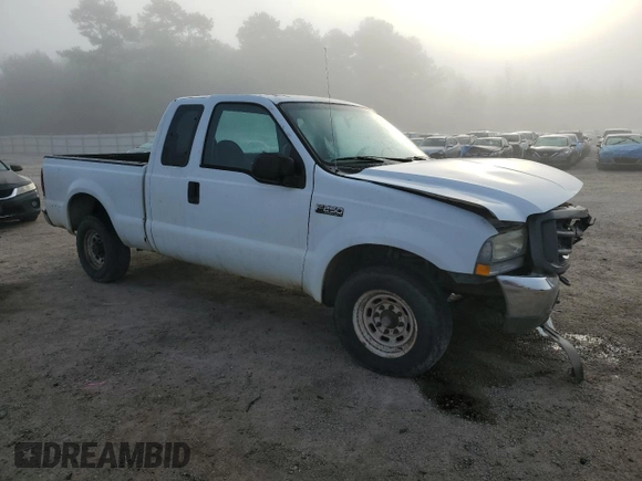 2004 Ford Super Duty F-250 XL with VIN 1FTNX20L34EB74712, listed as a Copart auction lot 72025064 with 141,857 mi miles and Salvage Title. Bid and sale history available at carsss.com. Image 4.