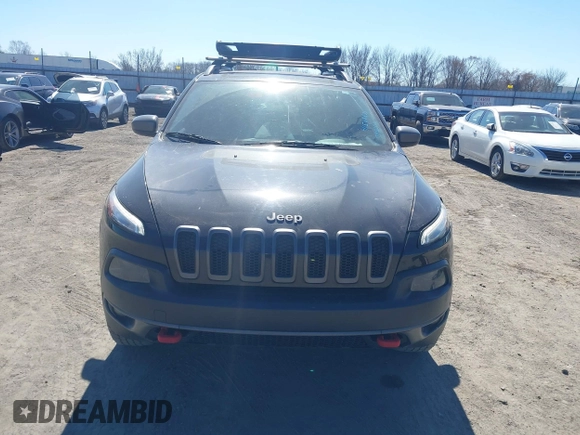 2015 Jeep Cherokee Trailhawk with VIN 1C4PJMBS5FW577470, listed as a IAAI auction lot 41565837 with 191,105 mi miles. Bid and sale history available at carsss.com. Image 12.