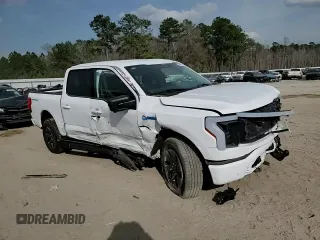 2024 Ford F-150 Lightning Flash z VIN 1FT6W3L70RWG21137, wystawiony jako Copart lot #48894615 z przebiegiem Nie podano mil oraz Szkoda całkowita • Salvage title. Historia ofert i sprzedaży dostępna na DreamBid. Obrazek 11.