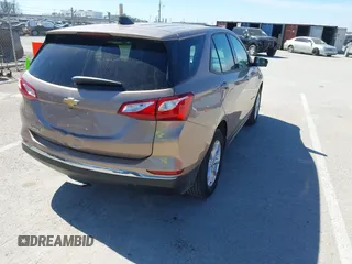2018 Chevrolet Equinox LS with VIN 2GNAXHEV2J6160948, listed as a IAAI auction lot 41818156 with 152,457 mi miles and . Bid and sale history available at DreamBid. Image 4.